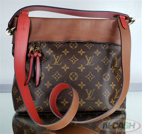 LOUIS VUITTON Monogram Tuileries Hobo Caramel.